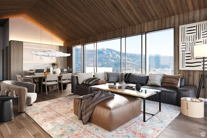 Living room featuring hardwood / wood-style floors, a mountain view, wood ceiling, and vaulted ceiling