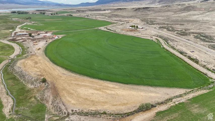 Aerial view of sparsely populated area featuring a mountainous background