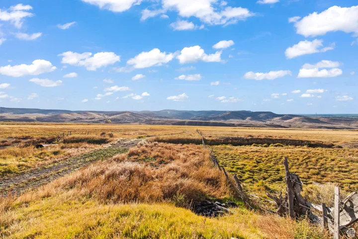 Property view of mountains featuring a rural view