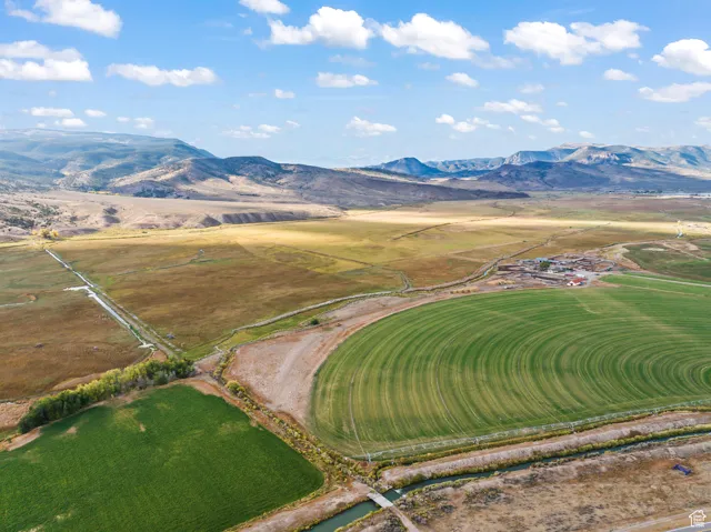 Drone / aerial view featuring a mountain view and a rural view