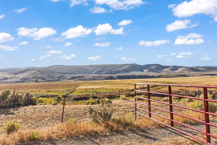 Property view of mountains featuring a rural view