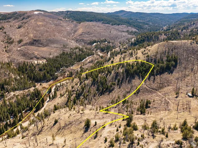 View of property location featuring mountains and property parcel outlined