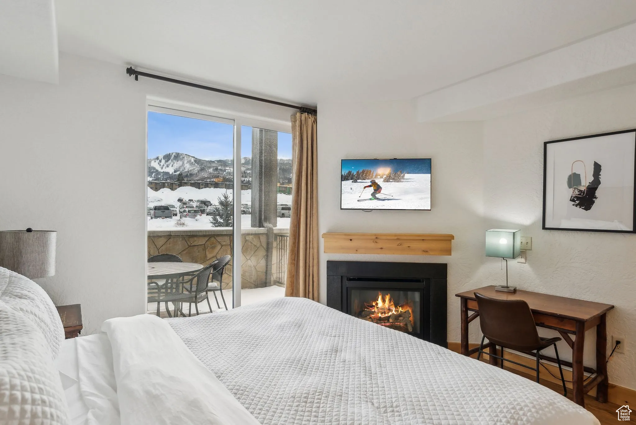 Bedroom with wood-type flooring and a mountain view
