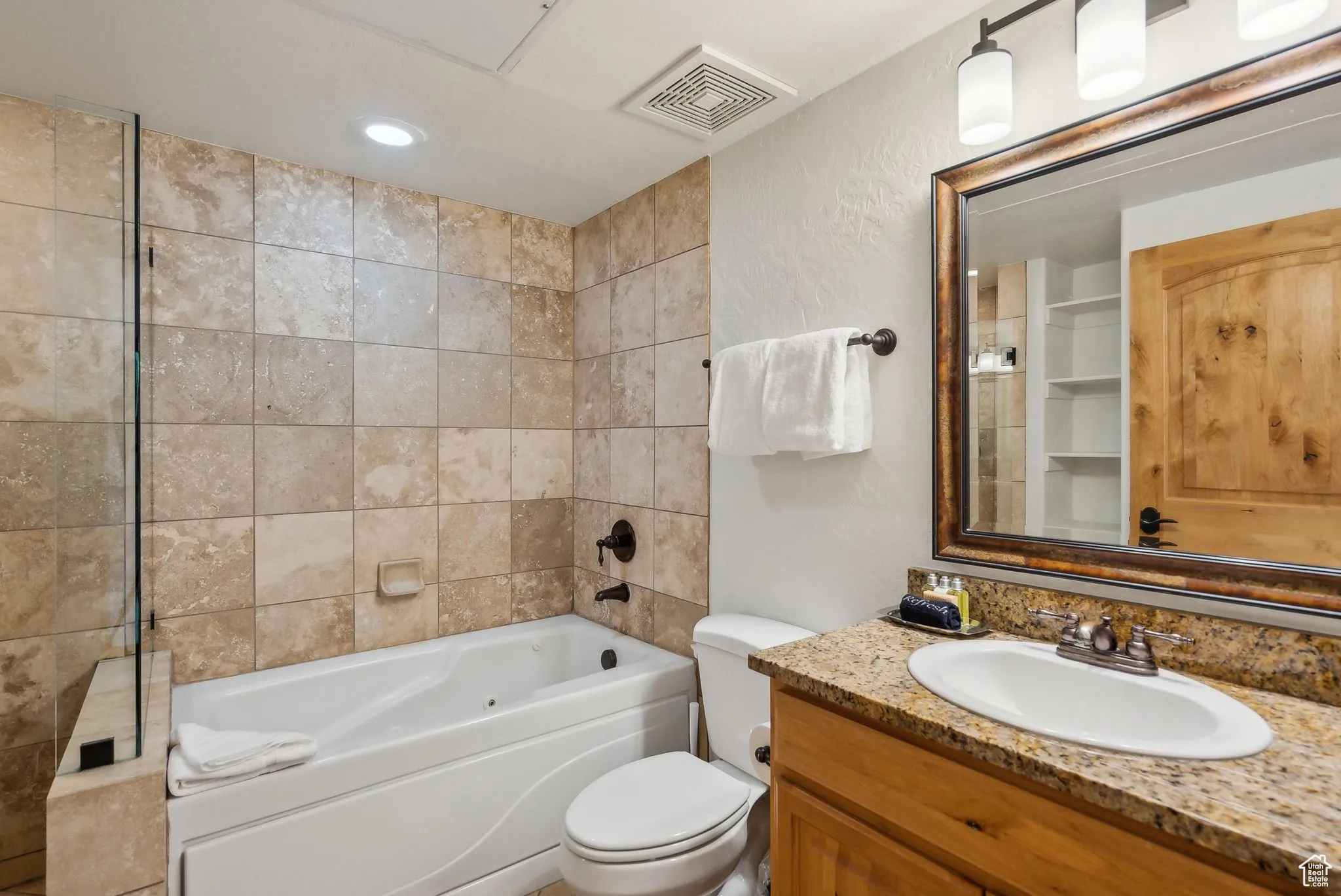 Bathroom featuring toilet and vanity