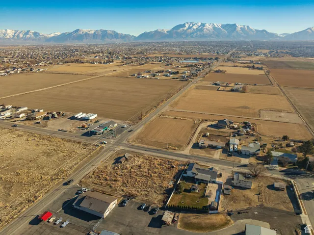 Birds eye view of property with a mountain view