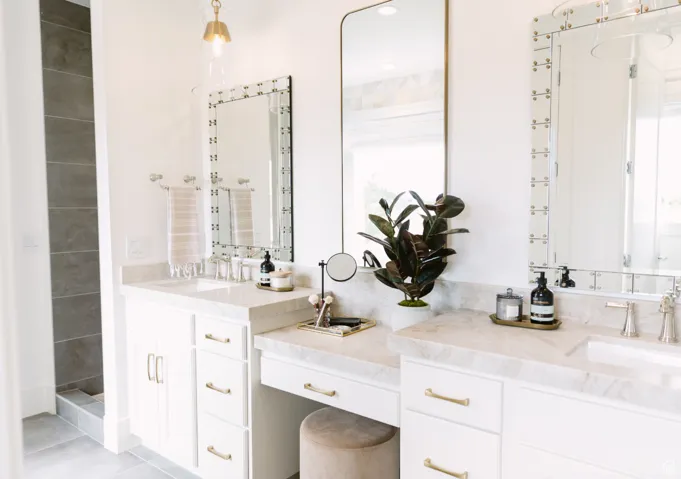 Bathroom with vanity and tile patterned floors
