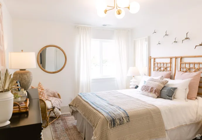 Bedroom with a chandelier