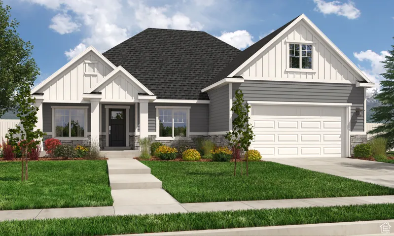 View of front facade featuring a front yard