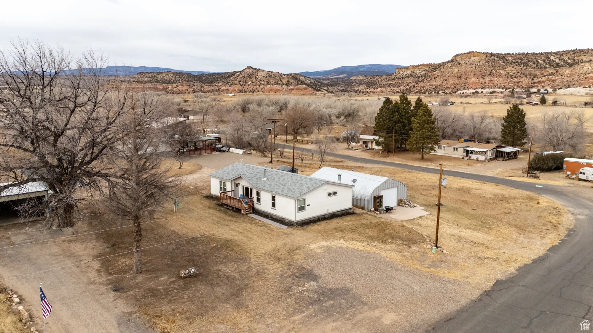Birds eye view of property with a mountain view
