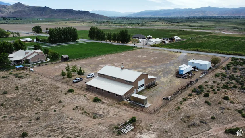 Drone / aerial view with a mountain view and a rural view