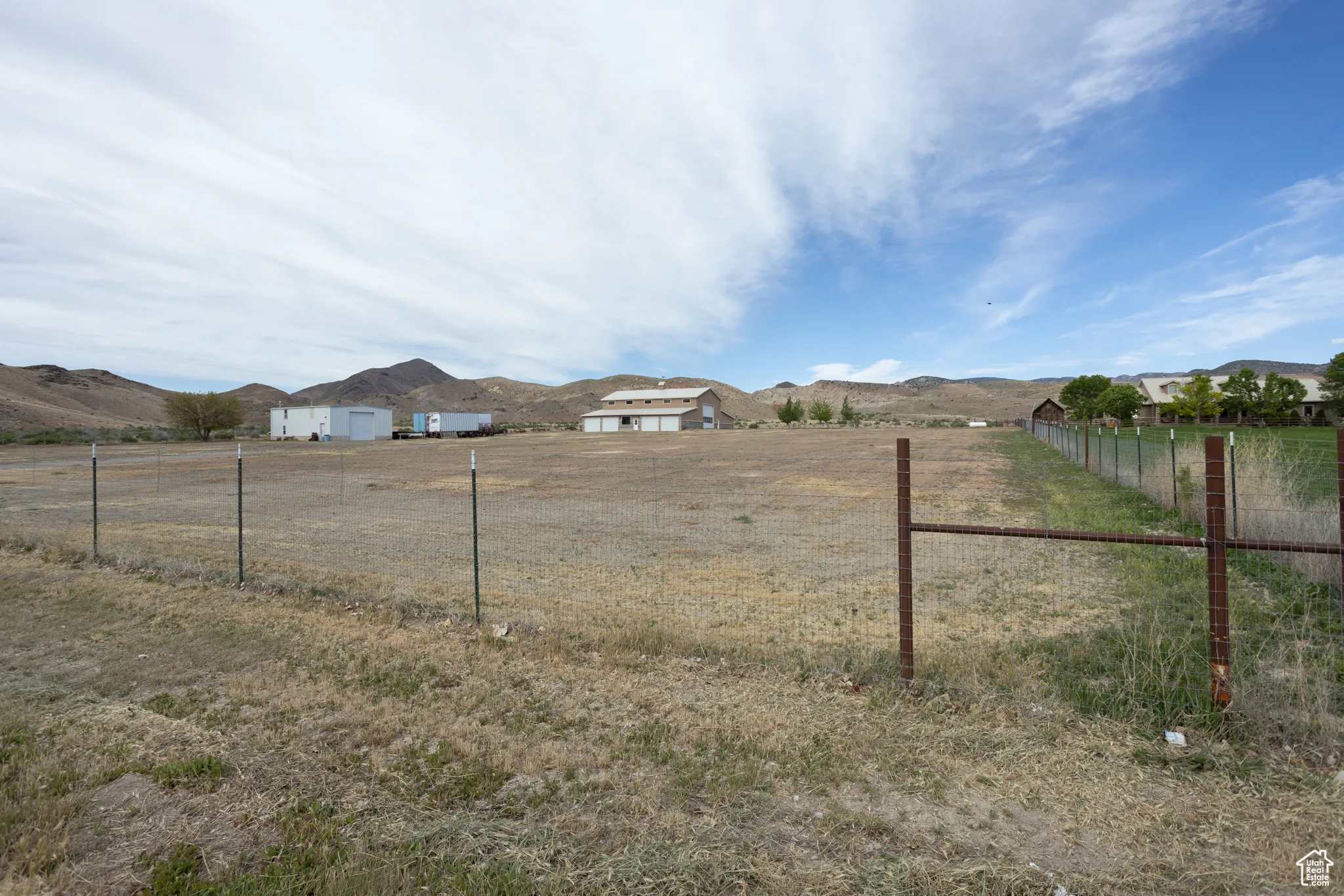 View of yard with a mountain view and a rural view