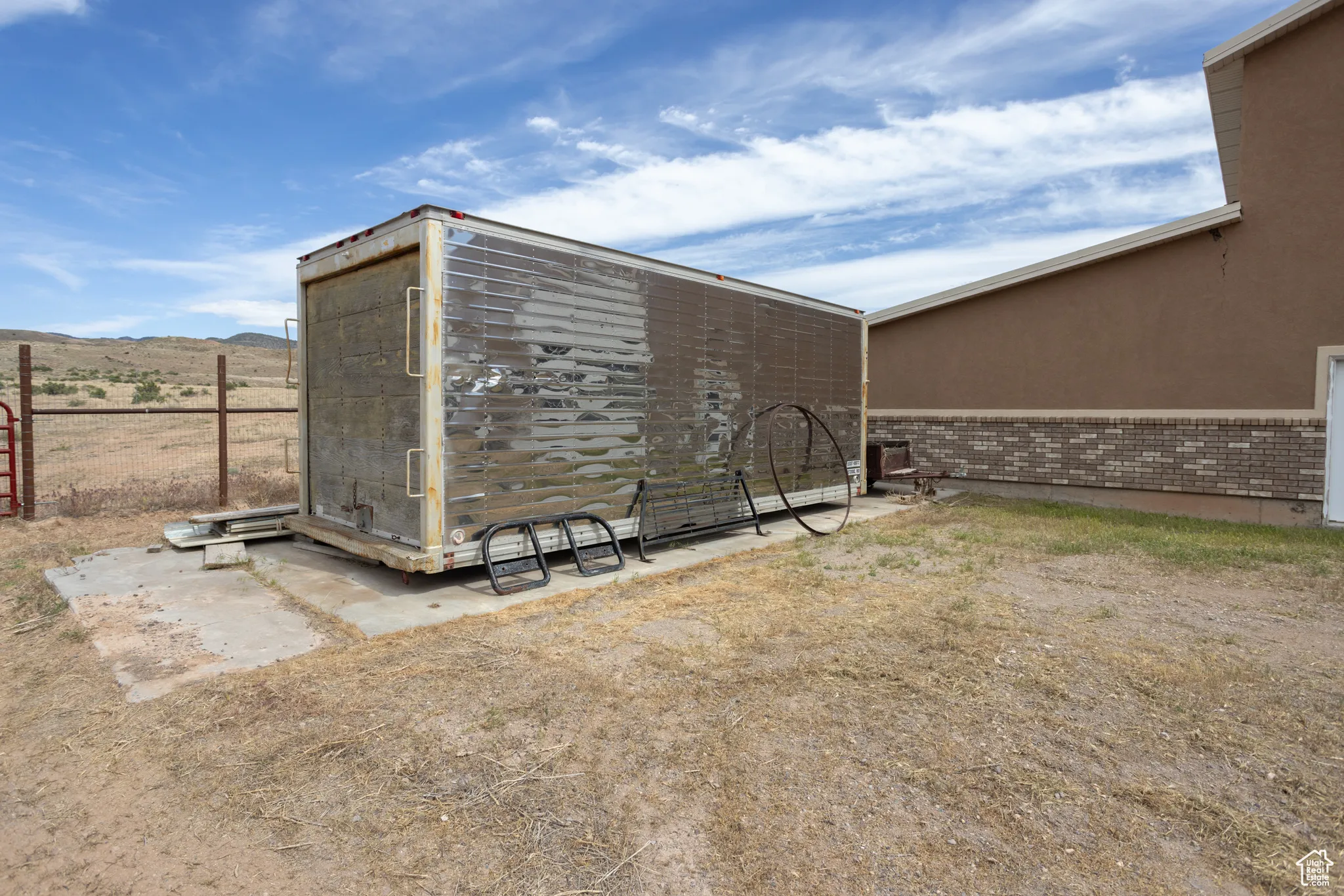 View of outbuilding featuring a mountain view