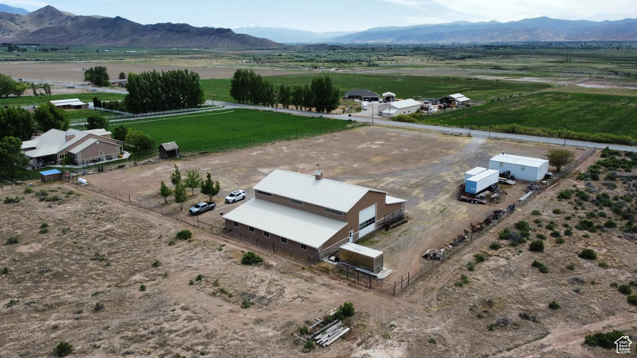 Aerial view featuring a rural view and a mountain view