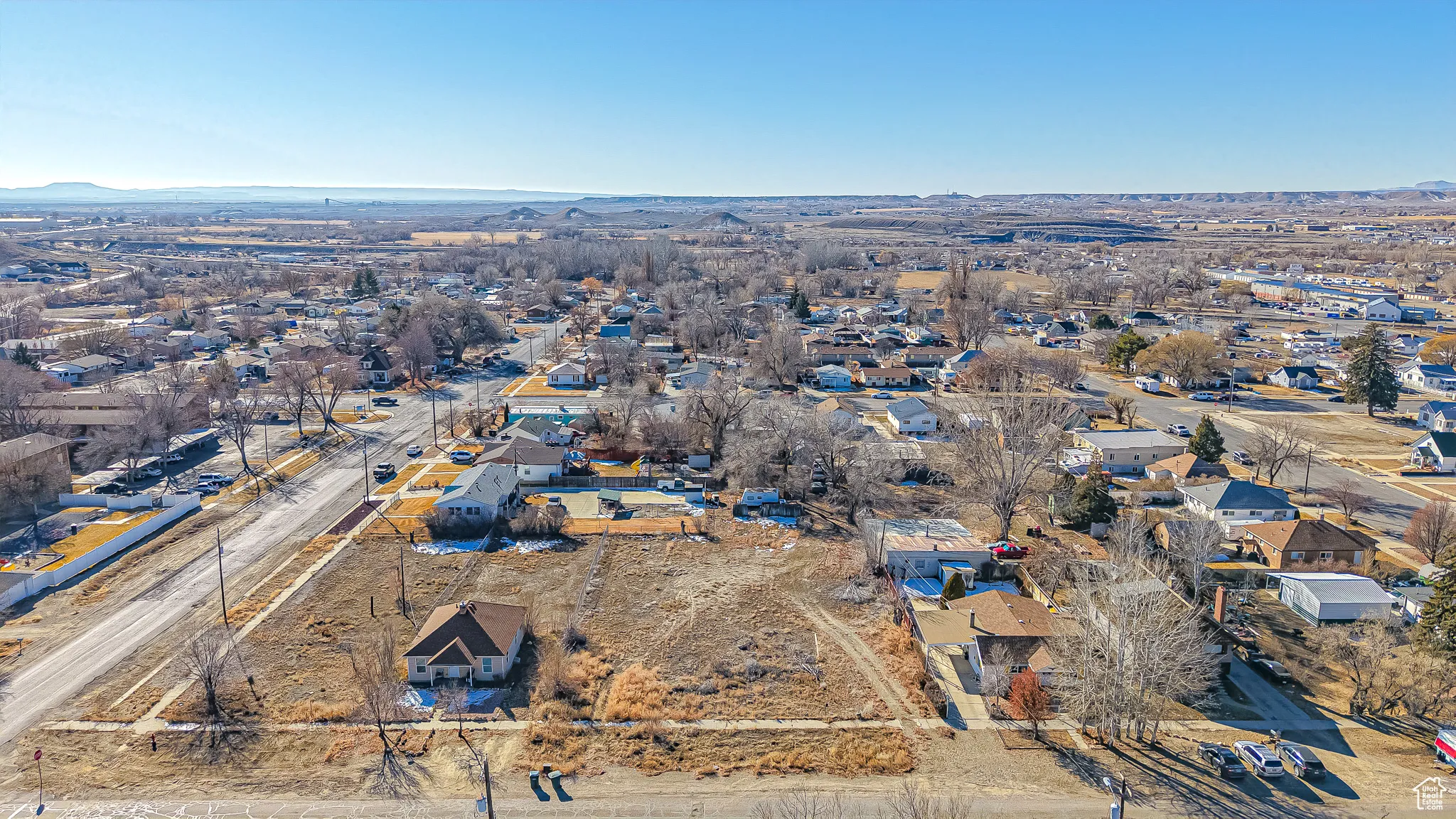 Birds eye view of property with a mountain view