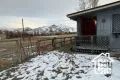 View of yard layered in snow