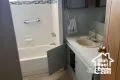 Bathroom featuring vanity and bathtub / shower combination