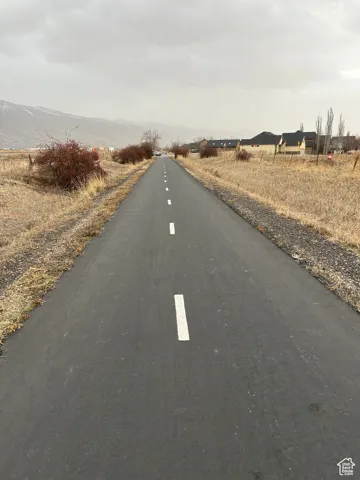 View of street featuring a rural view and a mountain view