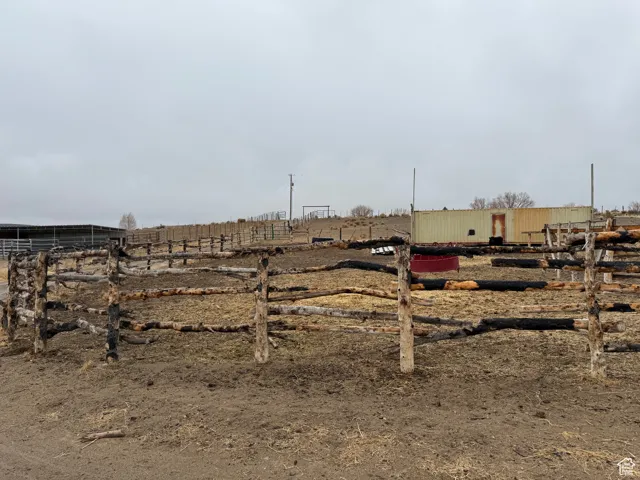 View of yard with a rural view