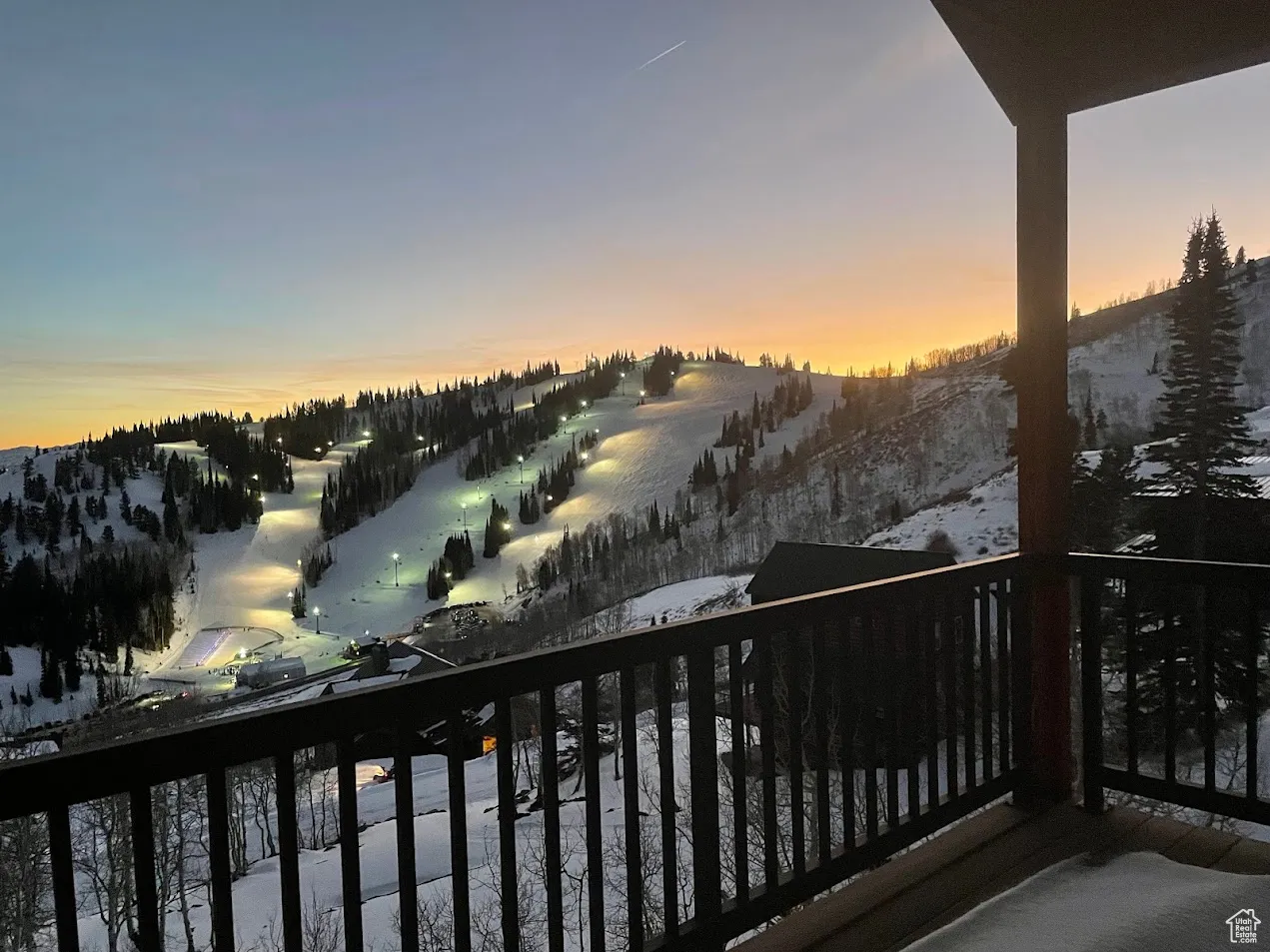 covered deck on back of property featuring a view  of the sundown lift
