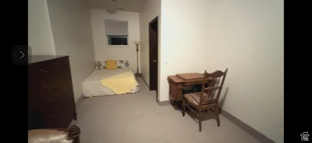 Oversized upstairs bedroom featuring light colored carpet large bedroom with two closets
