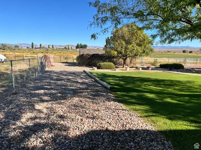 Access to acreage behind home