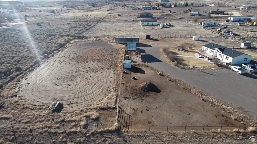 Birds eye view of property featuring a rural view