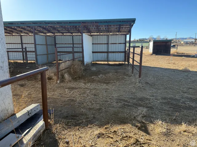 View of yard with an outbuilding