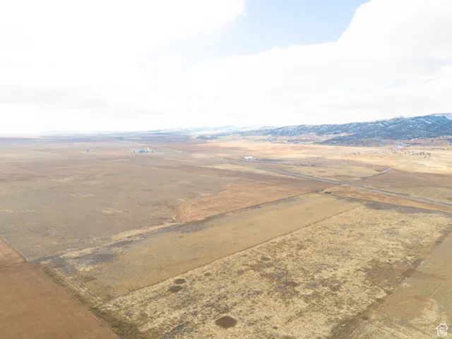Aerial view with a mountain view and a rural view