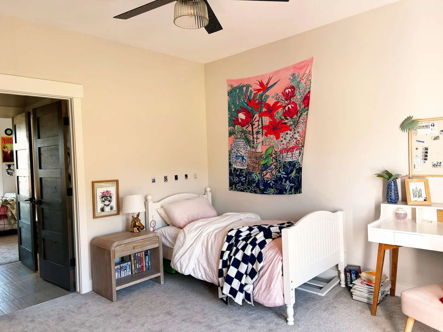 Interior room featuring light-toned walls and plush grey carpet