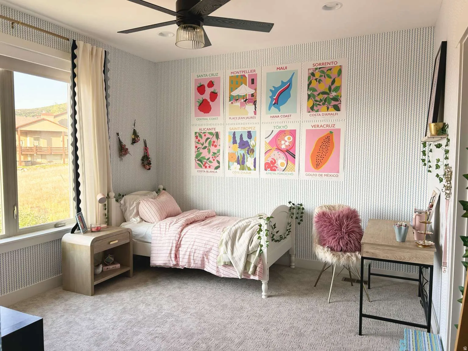Light-colored carpeting complementing striped wallpaper