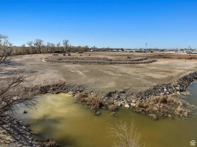 Drone / aerial view featuring a water view and a rural view