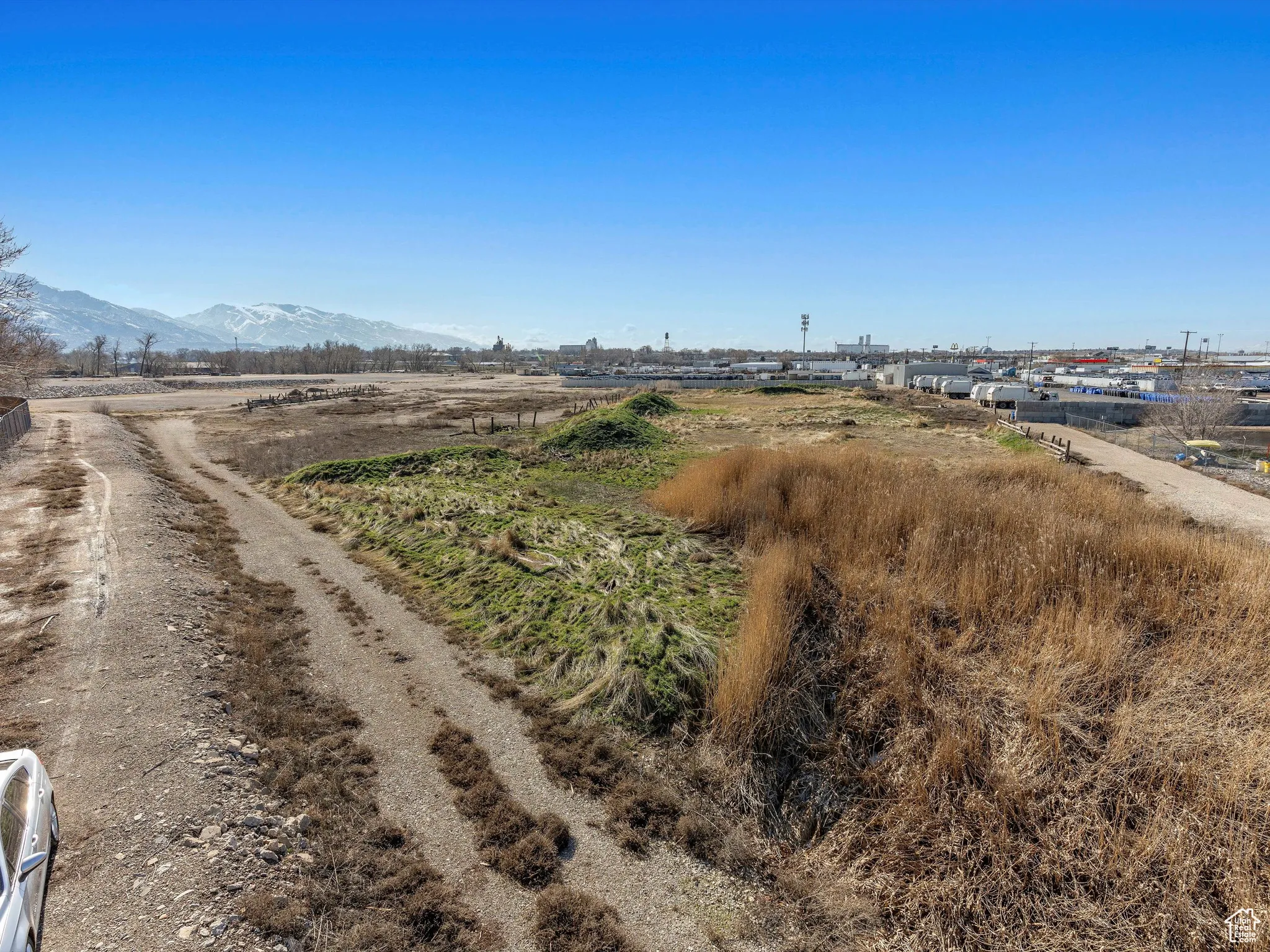View of street with a mountain view and a rural view