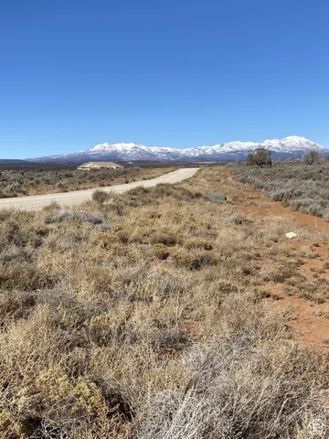 Property view of mountains featuring a rural view