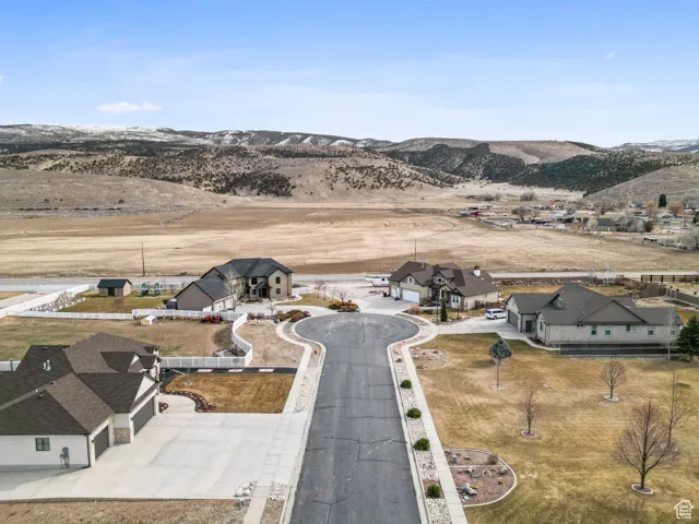 Drone / aerial view featuring a residential view and a mountain view