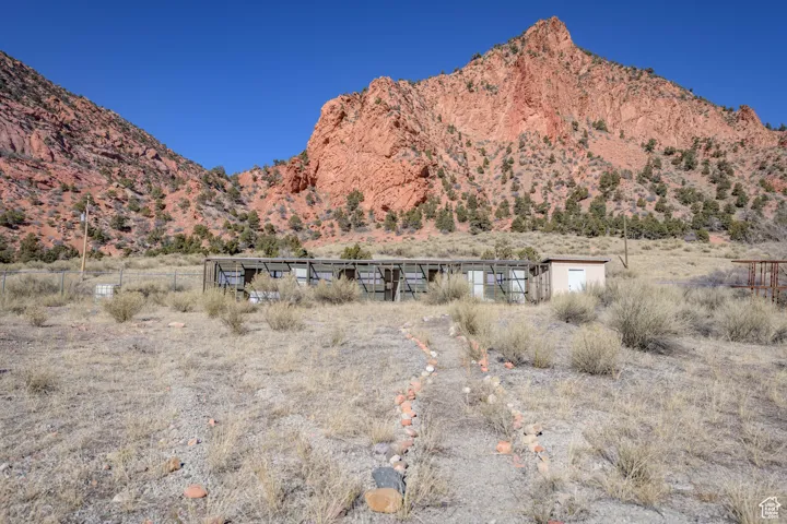 Property view of mountains featuring a rural view