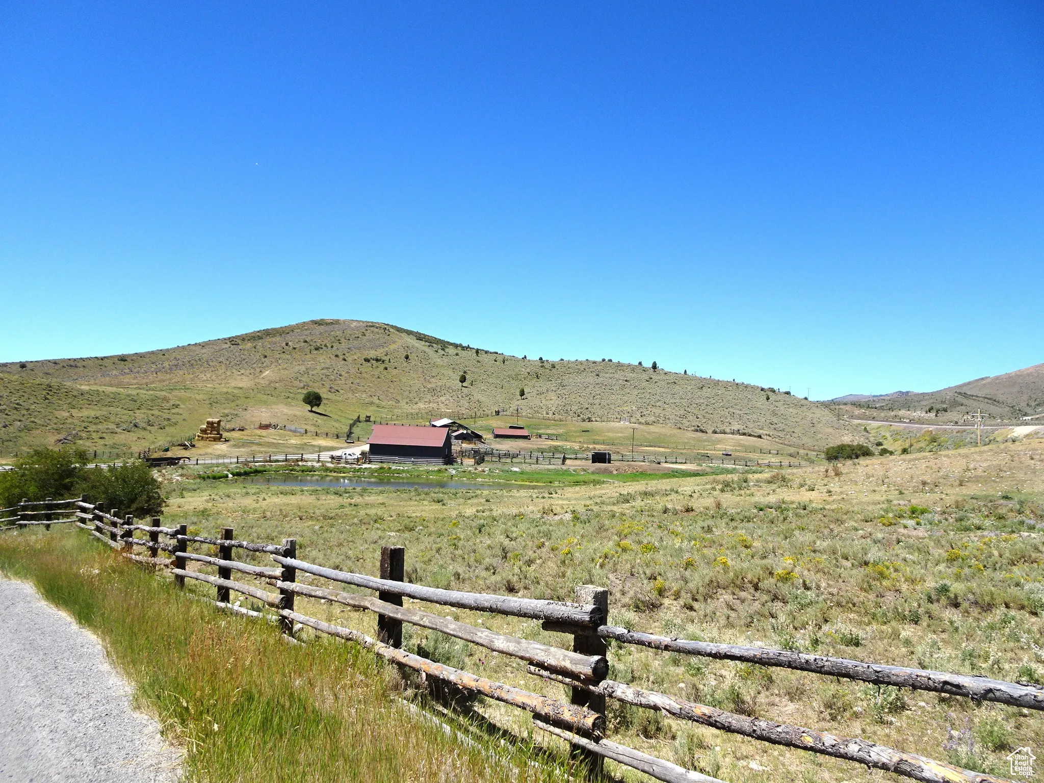 Mountain view featuring rural landscape and a pastoral area