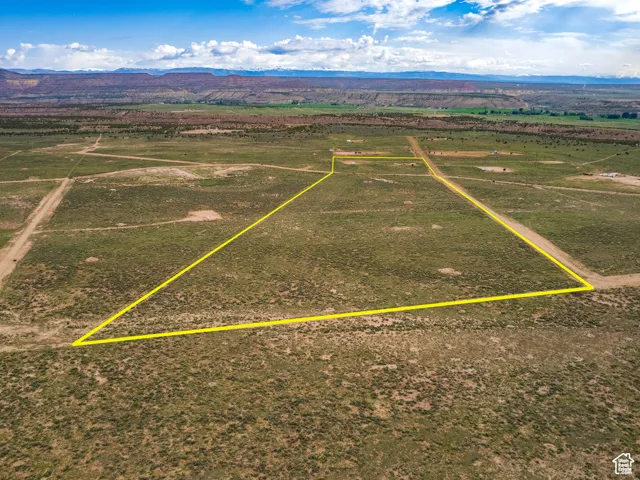 Drone / aerial view featuring a rural view and a mountain view