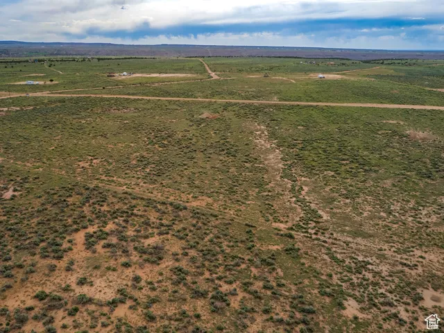 Birds eye view of property featuring a rural view
