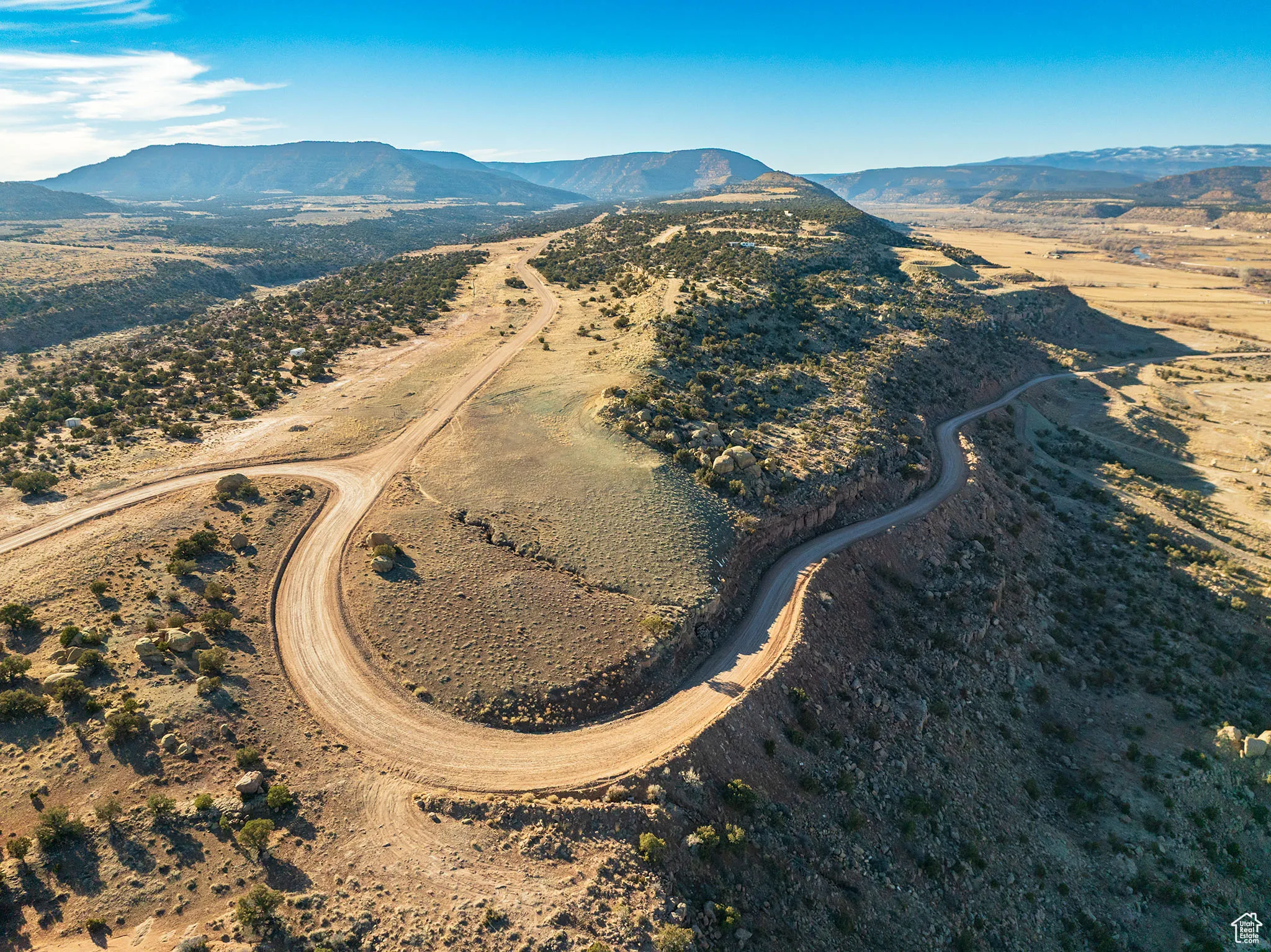 Birds eye view of property with a mountain view