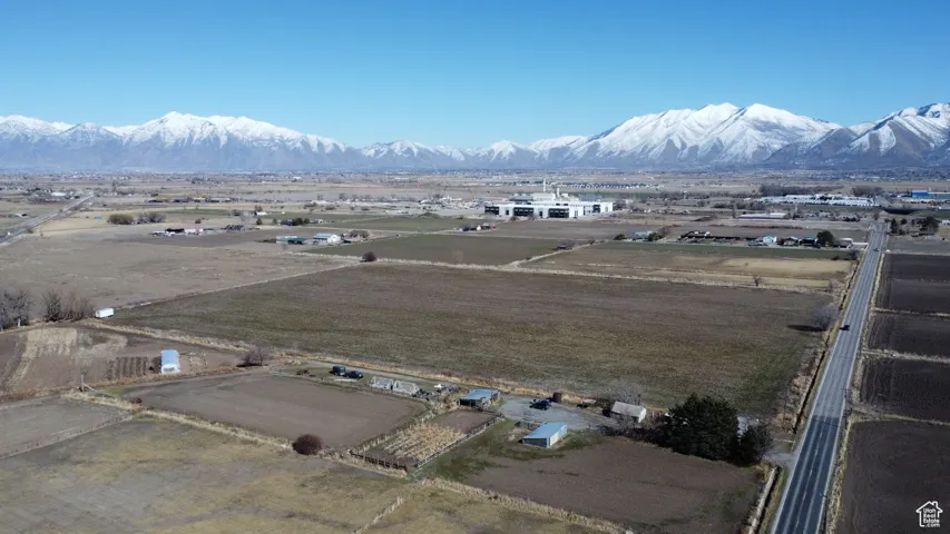 View of mountain feature with a rural view with Commercial Warehouse in the background