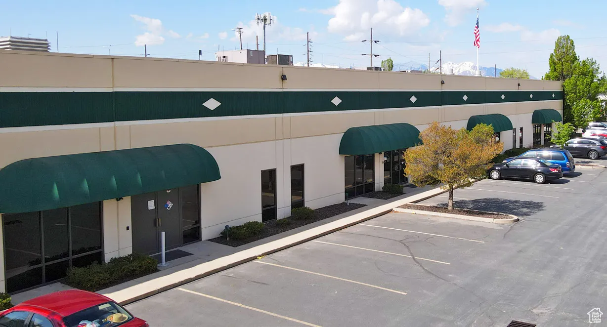 Exterior space with uncovered parking