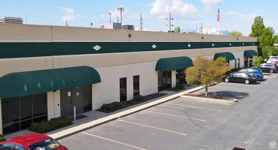 Exterior space with uncovered parking