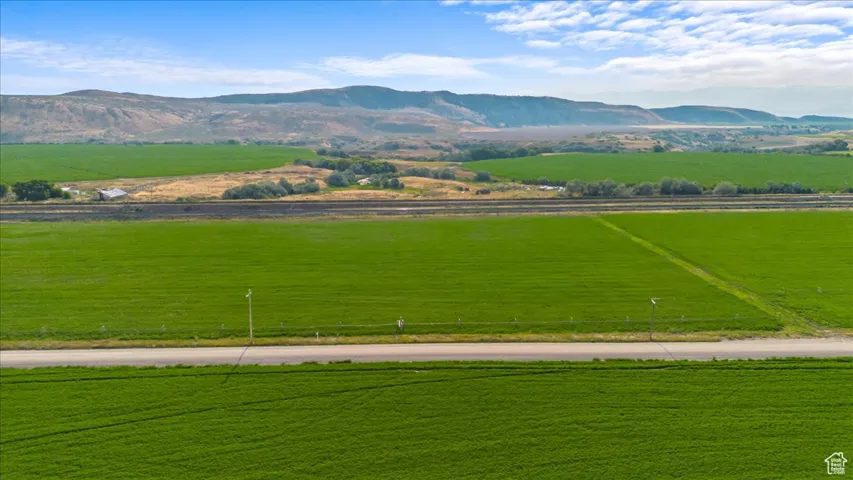 Property view of mountains with a rural view