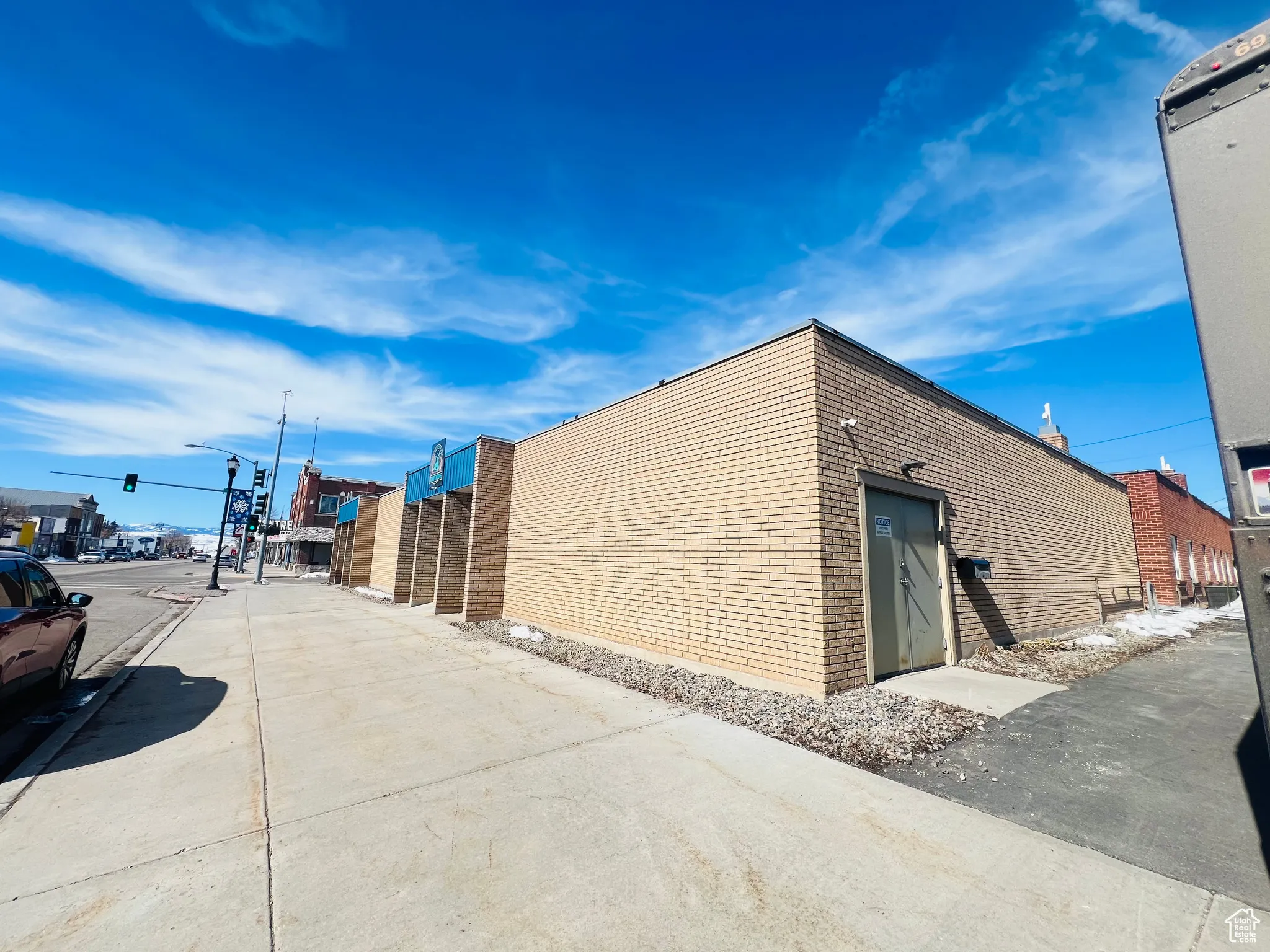 View of home's exterior featuring brick siding