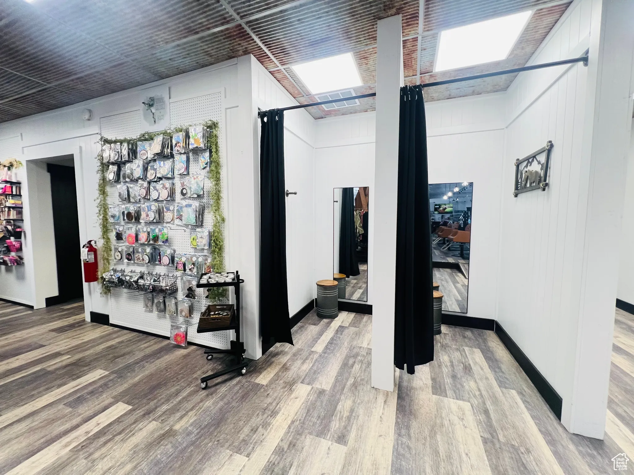 Interior space with wood finished floors and baseboards