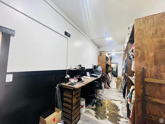Office area featuring wood finished floors
