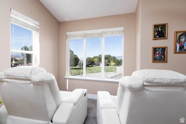 Living area featuring baseboards