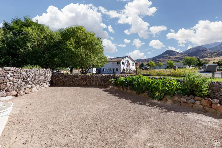 View of yard featuring a mountain view