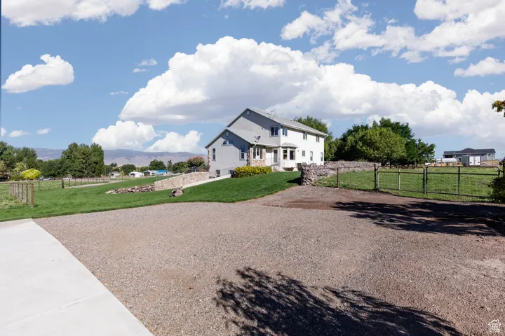 Back of house with a mountain view