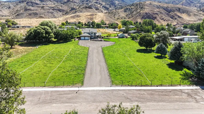 Overview of rural landscape with a mountain backdrop